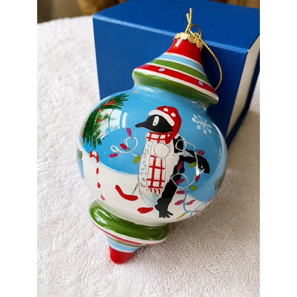 Pier 1 Li Bien glass ornament featuring handpainted penguin design original box